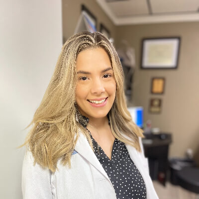 Dr. Claudia Bello, OD